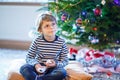 Little kid boy playing video game console on Christmas Royalty Free Stock Photo