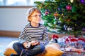 Little kid boy playing video game console on Christmas Royalty Free Stock Photo