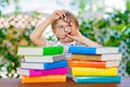 Little kid boy reading book at school Royalty Free Stock Photo