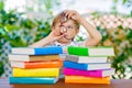 Little kid boy reading book at school Royalty Free Stock Photo