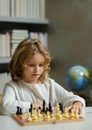 Little kid chessman play chess game, checkmate.