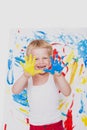 Little kid draws bright colors. School. Preschool. Education. Creativity Royalty Free Stock Photo