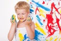 Little kid draws bright colors. School. Preschool. Education. Creativity. Studio portrait over white background Royalty Free Stock Photo