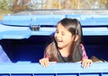 Little kid - girl hiding in a container Royalty Free Stock Photo