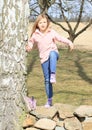 Little kid - girl kicking off her shoe Royalty Free Stock Photo