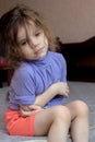 Little kid girl with pain in elbow.