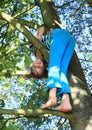 Little kid - girl standing on branch