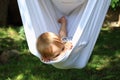 Little kid in hammock chair