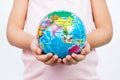 Little Kid Holding World Globe on Her Hands