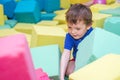 Little kid play with soft blocks at indoor children playground Royalty Free Stock Photo