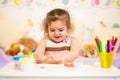 Little kid playing with colorful clay Royalty Free Stock Photo