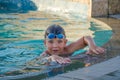 Little kid in swimming pool