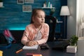 Little kid taking notes on class notebook for learning Royalty Free Stock Photo