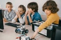 little kids constructing robots at stem Royalty Free Stock Photo