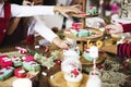 Little kids decorating Christmas sweets and desserts