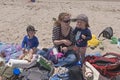 Little Kids eating lunch on the beach