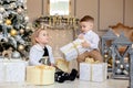 Little kids friendship and love. Little boy giving a little girl a gift. Present for a birthday, valentine`s day or other holiday Royalty Free Stock Photo