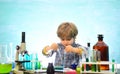 Little kids scientist earning chemistry in school lab. Knowledge day. School chemistry lessons. First grade. Chemistry Royalty Free Stock Photo