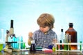 Little kids scientist earning chemistry in school lab. What is taught in chemistry. Lab microscope and testing tubes