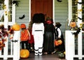 Little kids trick or treating Royalty Free Stock Photo