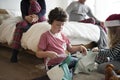 Little kids unwrapping Christmas presents Royalty Free Stock Photo