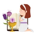 little kneeling girl with bible and flowers first communion