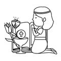 little kneeling girl with bible and flowers first communion