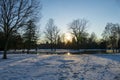 little lake Favorite Foerch Palace with snow at sunset, in winter time Royalty Free Stock Photo