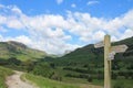 A wooden signpost in the English Lake District Cumbria Royalty Free Stock Photo