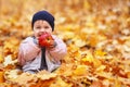 Little laughing girl in the autumn park Royalty Free Stock Photo