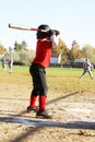 Little League player at bat.