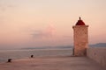 Little lighthouse in the beautiful harbor of a small town Postira Croatia, Brac island. Royalty Free Stock Photo