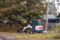 .little loader tractor with tracks working on construction site Royalty Free Stock Photo