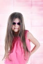 Little long-haired brunette in sunglasses