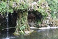 Little magic waterfall in a french garden Royalty Free Stock Photo