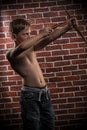 Little marksman-child with bow and arrow Royalty Free Stock Photo