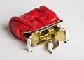 Little men to add Russian coins to the open red wallet Royalty Free Stock Photo