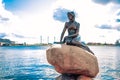 The Little Mermaid statue by the waterside at the Langelinie promenade in Copenhagen, Denmark Royalty Free Stock Photo