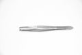 Little metal hair tweezers isolated over white background Royalty Free Stock Photo