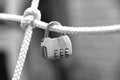 Little metall padlock on rope Royalty Free Stock Photo