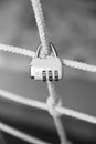 Little metall padlock on rope Royalty Free Stock Photo