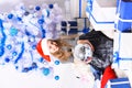 Little miss Santa holds disco ball. Winter holiday and party Royalty Free Stock Photo