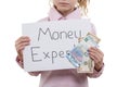 Little money specialist, child girl with cash bills of dollar and euro holding white sheet of paper with text money expert, white Royalty Free Stock Photo