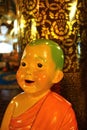 The Little monk doll in wat inthakin temple at chiang mai Thailand Royalty Free Stock Photo