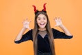 little monster. celebrate the holidays. cunning little demon. halloween devil girl. happy childhood. funny teenage child