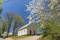 Dogwood blooms surround a little white church in Cades Cove. Royalty Free Stock Photo