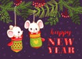 The little mouse is sitting in a mitten hanging on a Christmas tree branch Royalty Free Stock Photo