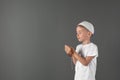 Little Muslim boy praying