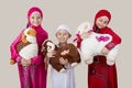 Little Muslim kids playing with sheep toys