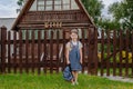 Little naughty Russian girl spends summer vacation in the village.